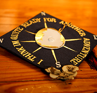 graduation cap with decorations on it