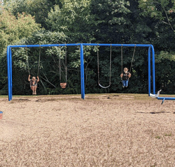 Students on swing set