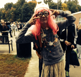 Student with pink hair and silly glasses