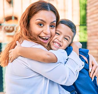 Parent hugging child