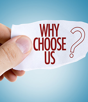 Hand holding a note that says why choose us