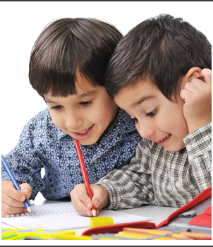 Two little boys working together